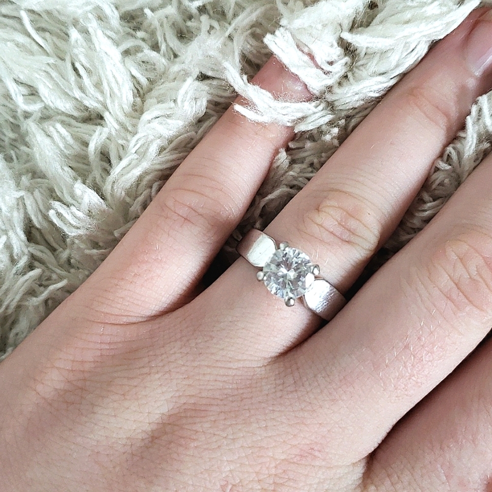 Silver band diamond ring
